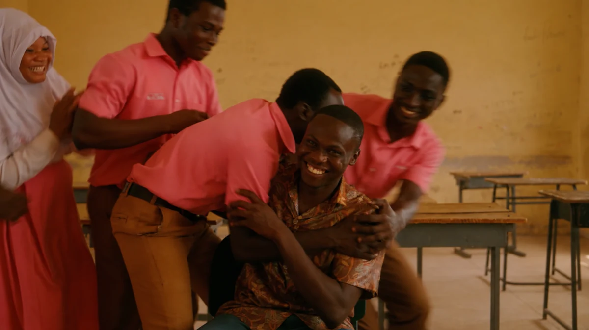 Students celebrating together in a classroom